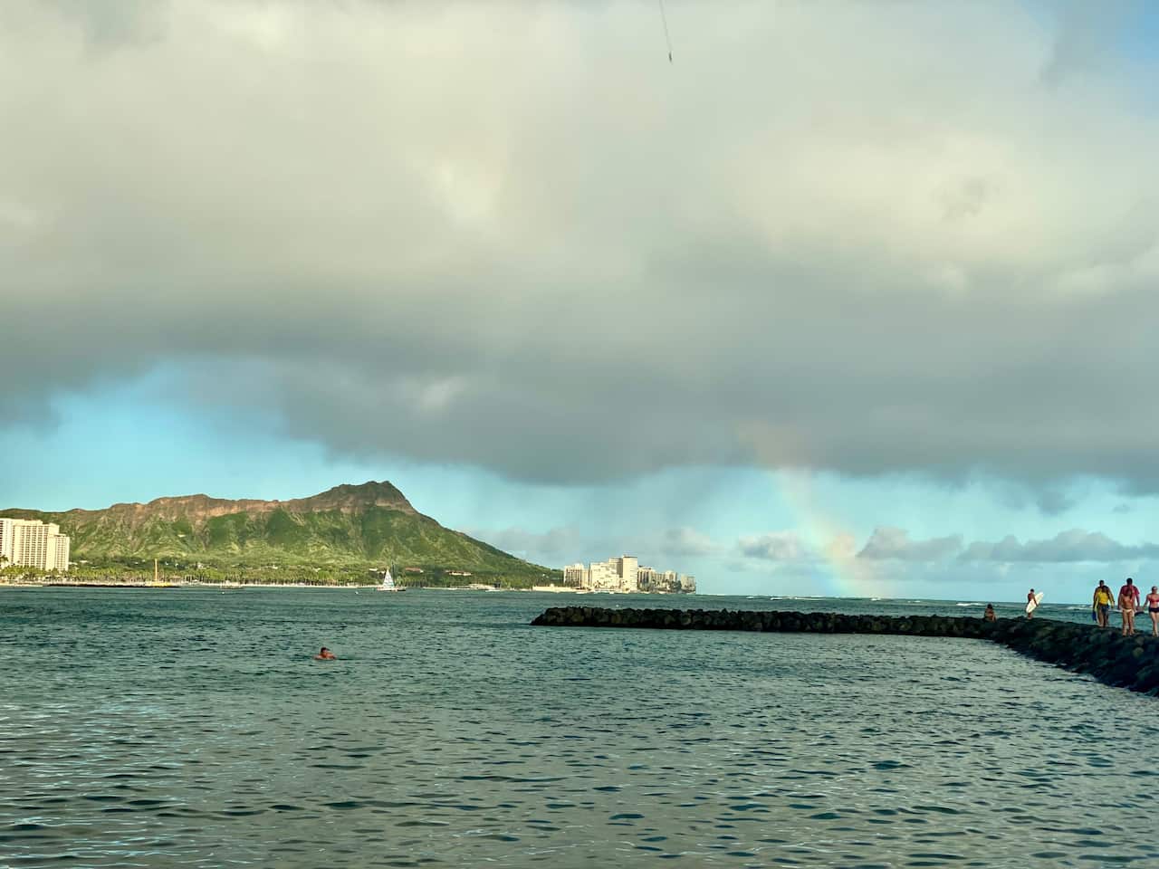 A rainbow comes out over Diamond Head in Honolulu, Hawai'i