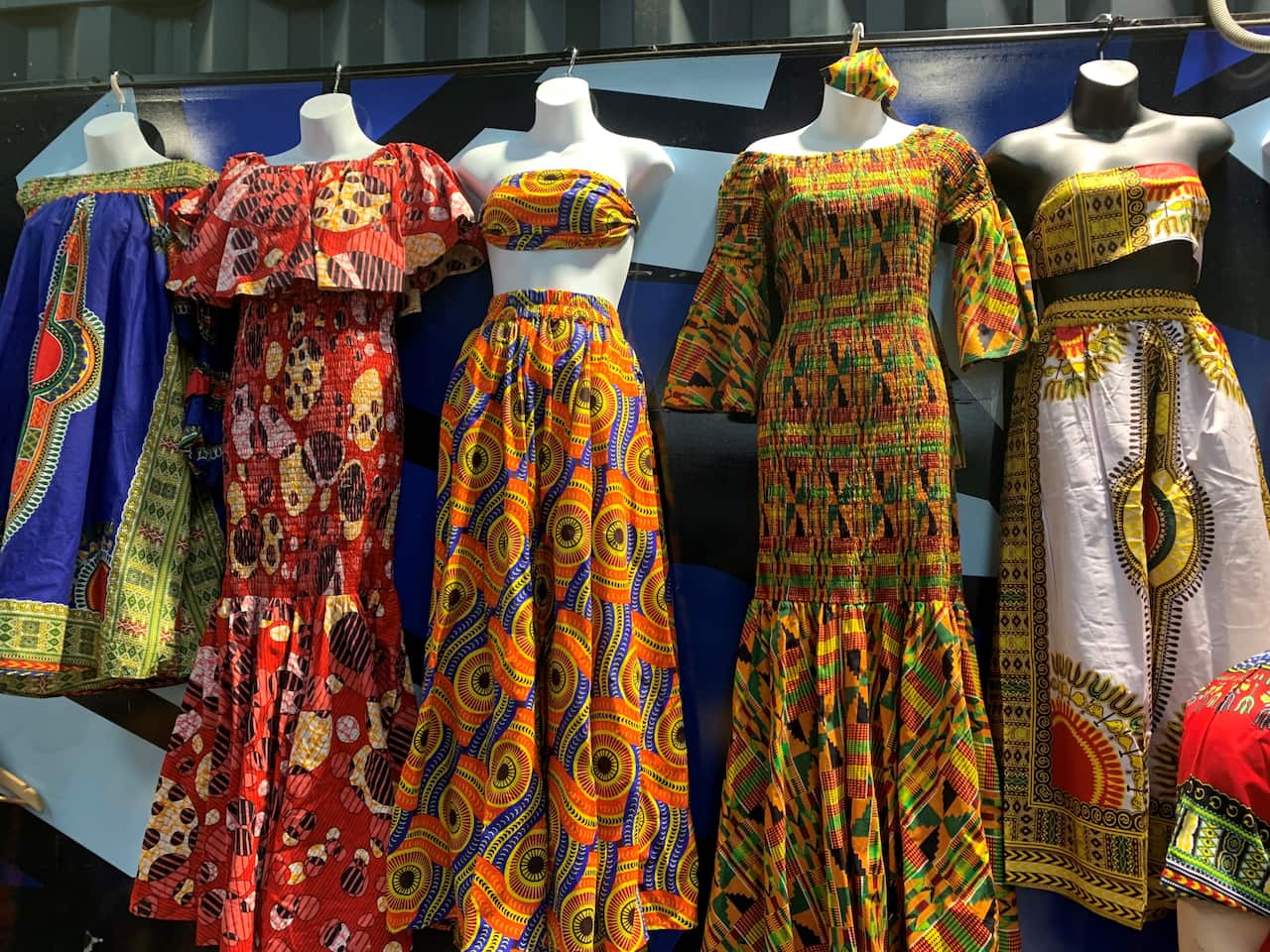 Salhe's African themed clothes hanging at the market stall