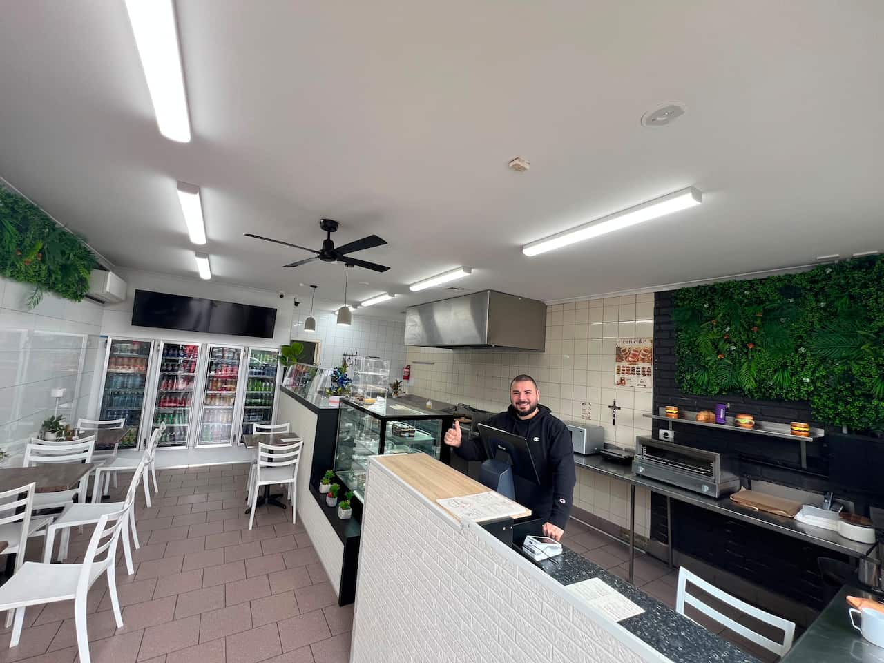 Loaui in his small Shop.JPG