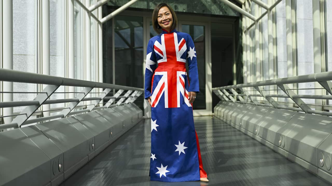 Dai Le wearing traditional Vietnamese dress with Australian flag print