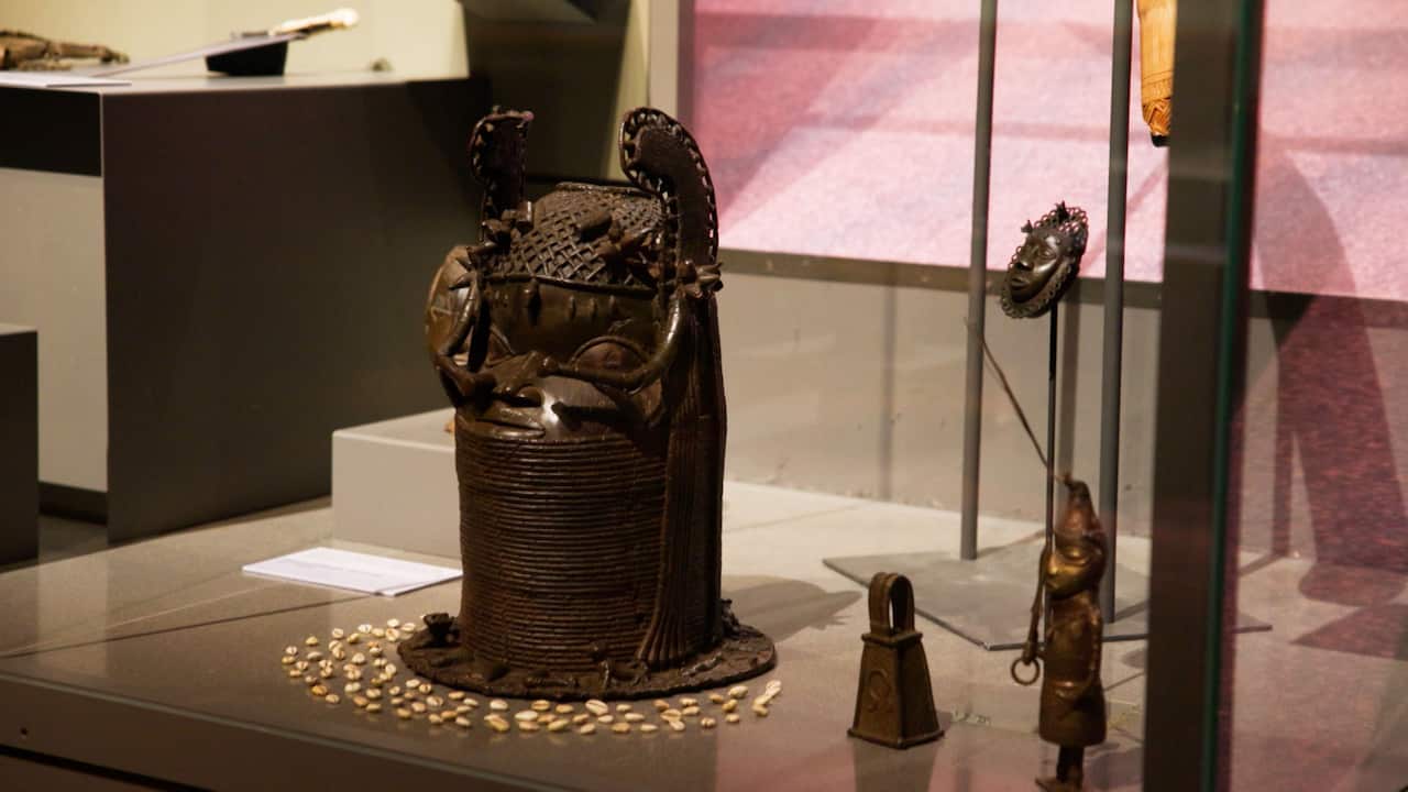 Bronze statues on display at a museum