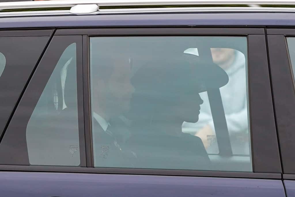 Prince Harry, Duke of Sussex and Meghan, Duchess of Sussex are seen on The Mall ahead of The State Funeral of Queen Elizabeth II. 