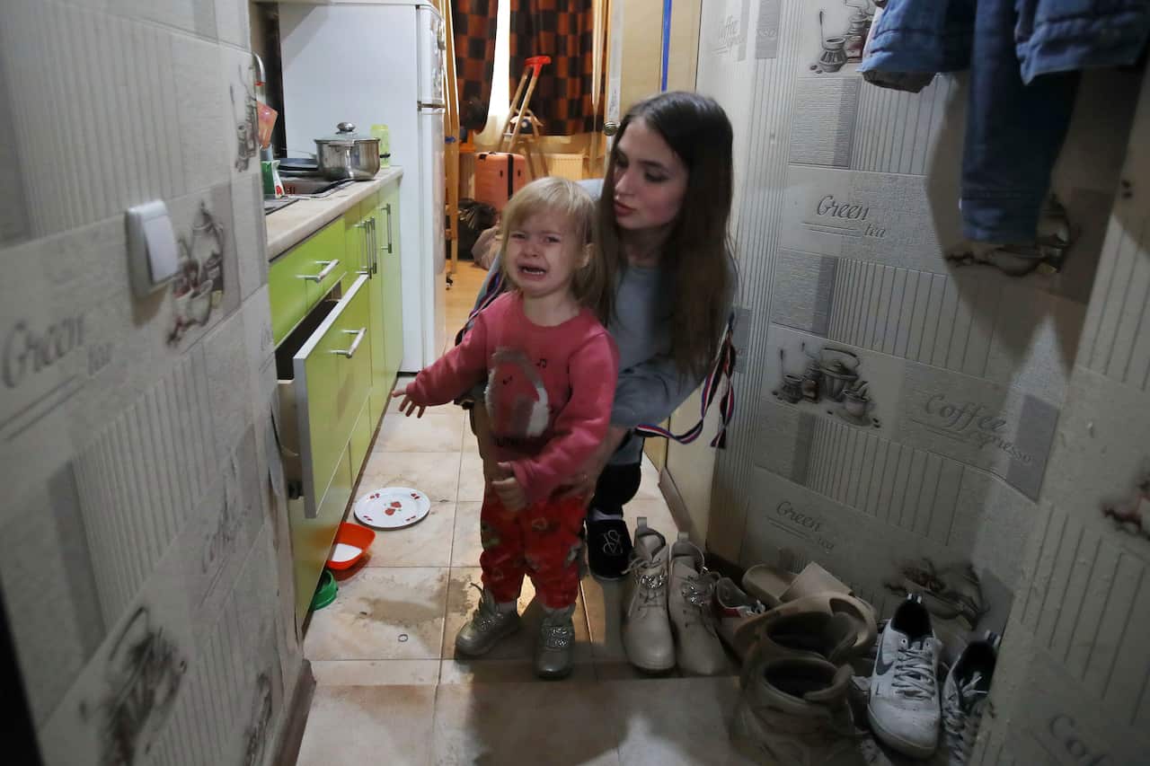 Russians strike residential building in Kharkiv