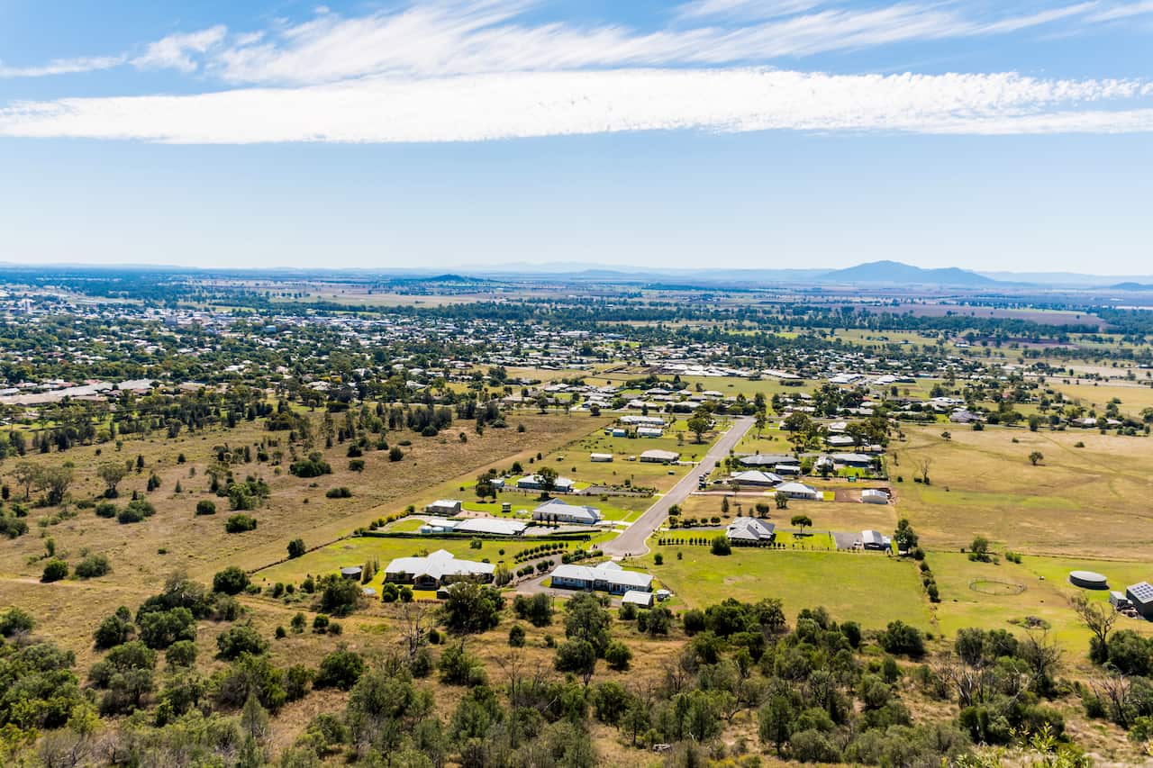 Beautiful view on the town suburb houses situated in picturesque valley surrounded by the hills. Porcupine lookout, Gunnedah, NSW, Australia