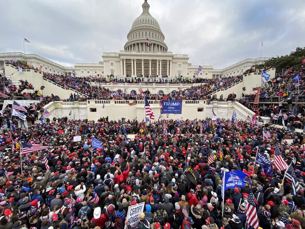 A large number of Trump supporters storm the Capitol building in Washington.