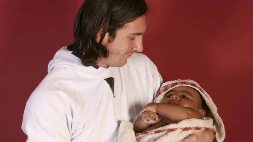 A man holding a baby