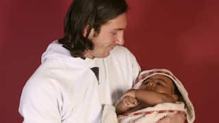 A man holding a baby