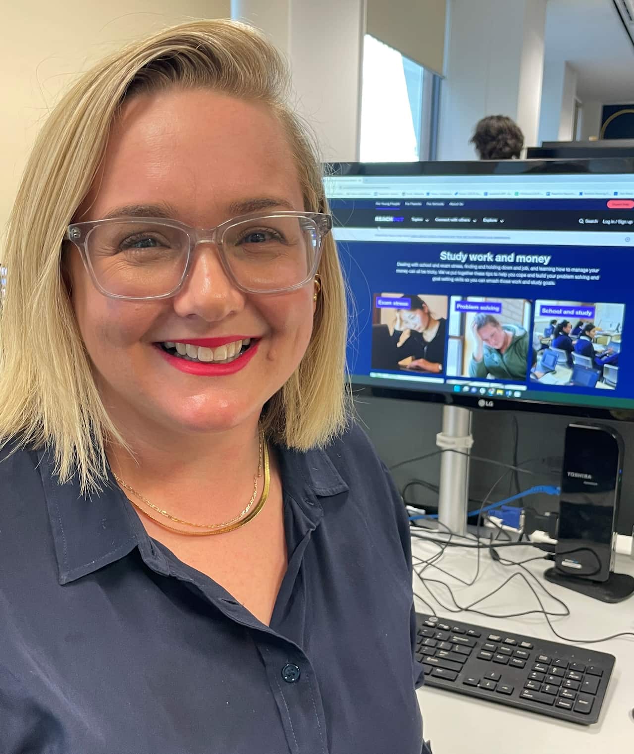 ReachOut's Jackie Hallan at her desk 