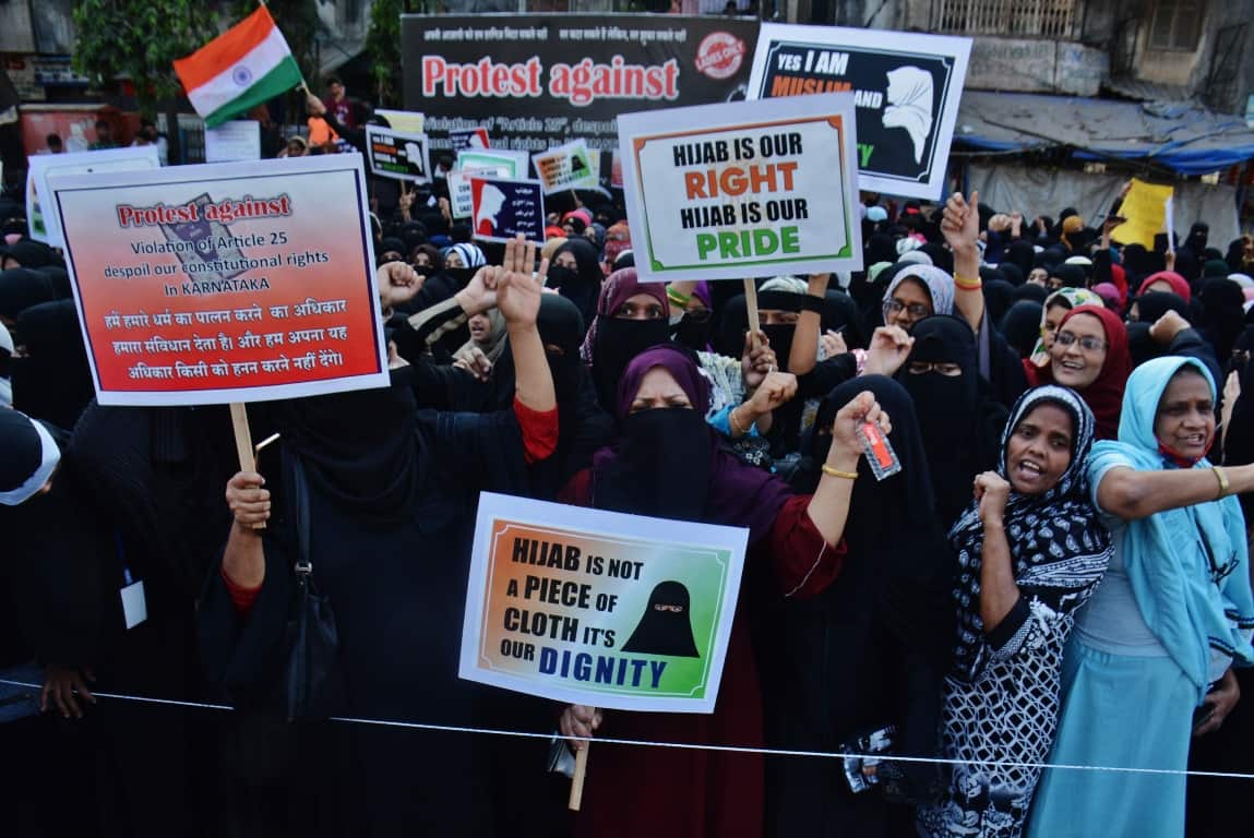 Women gather in protest. 