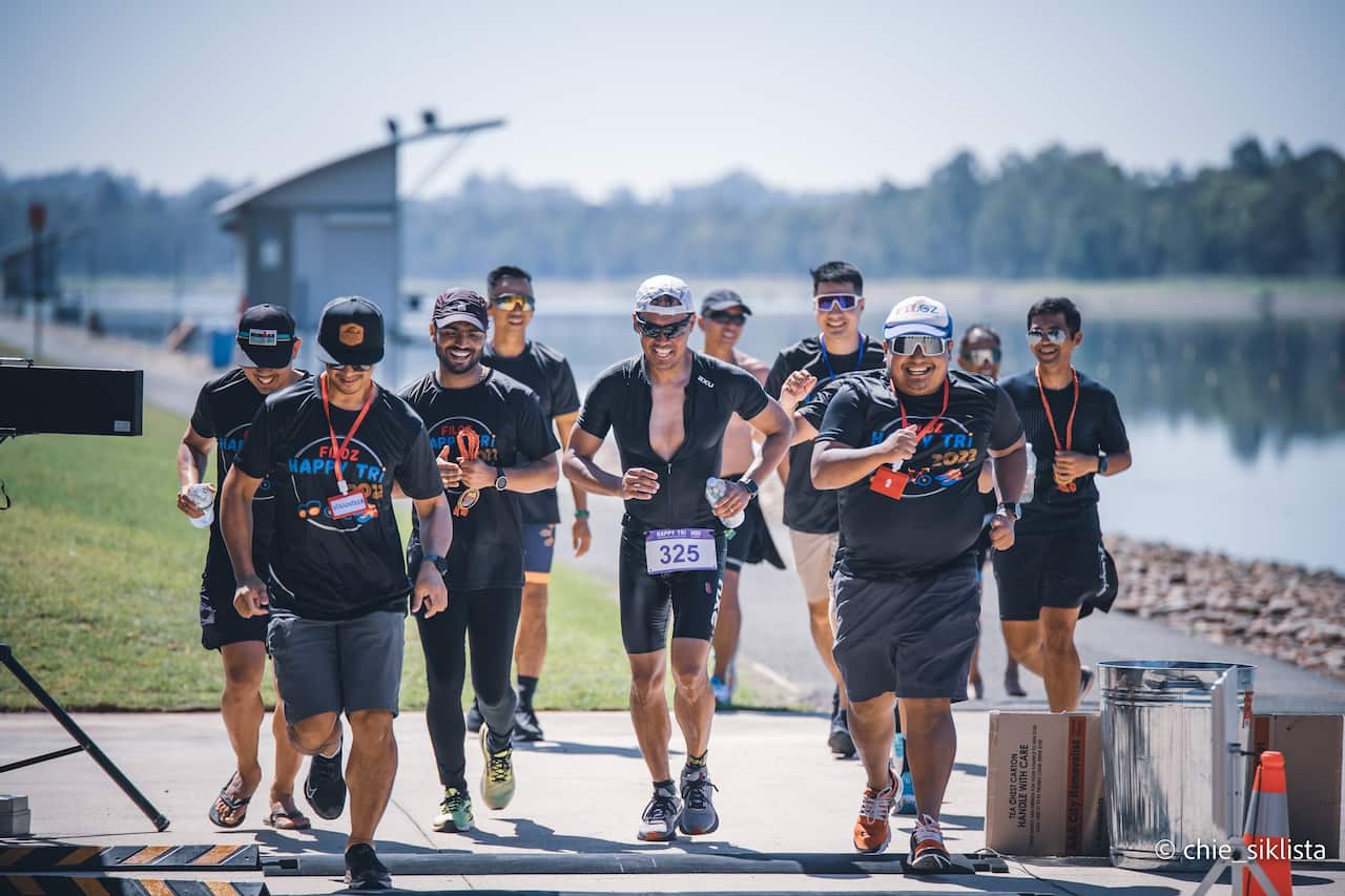 'Happy Triathlon' is not just about how fast you can swim-bike-run but how you have fun and finish the race.