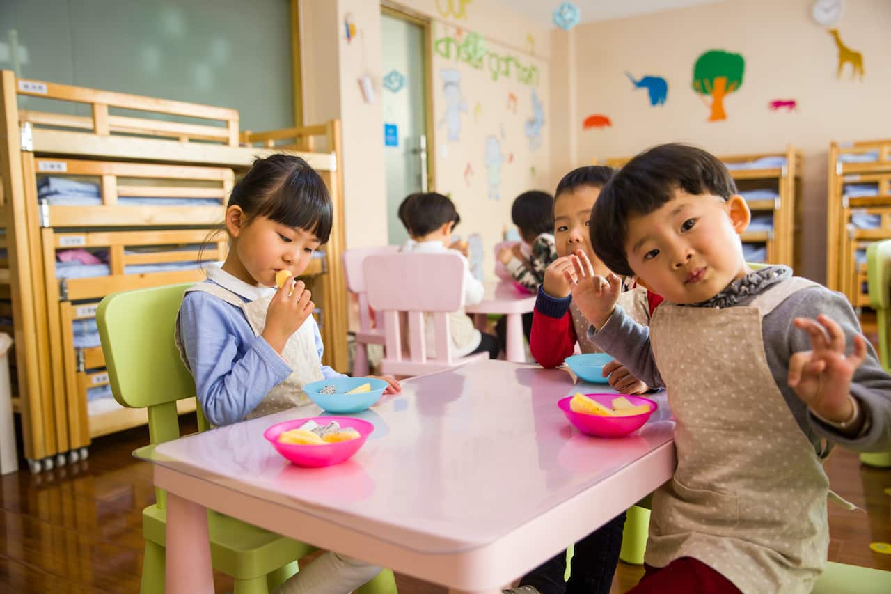 childcare,children-three toddler eating on white table-pexels-naomi-shi.jpg