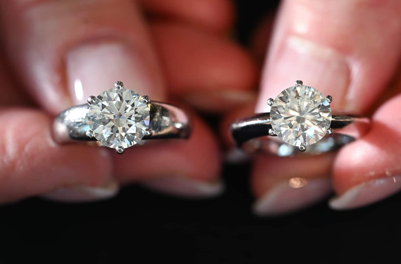 Two diamond rings side by side.