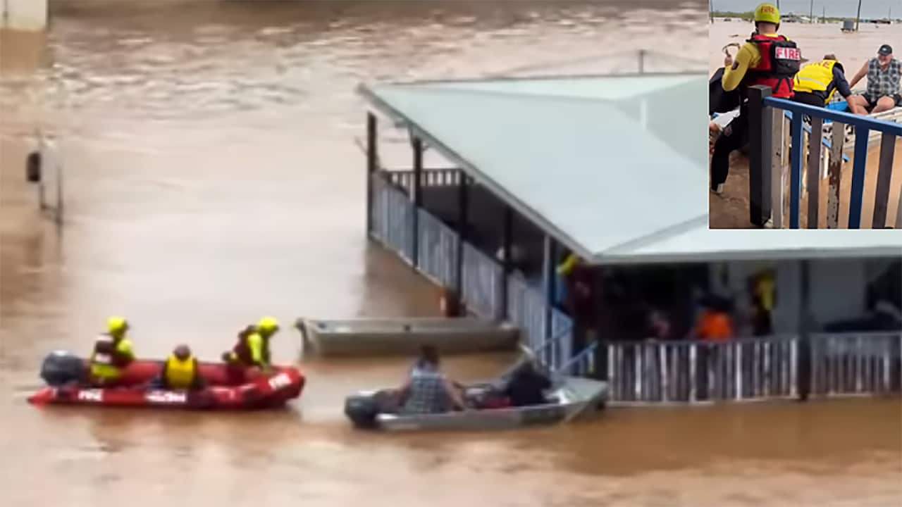 People being rescued from floodwaters
