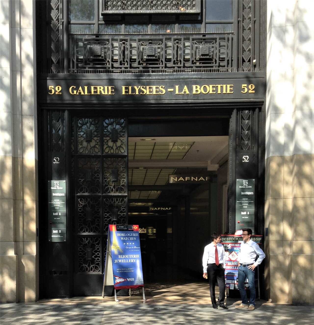 Michel's family stamp business was in this building on the Champs-Élysées