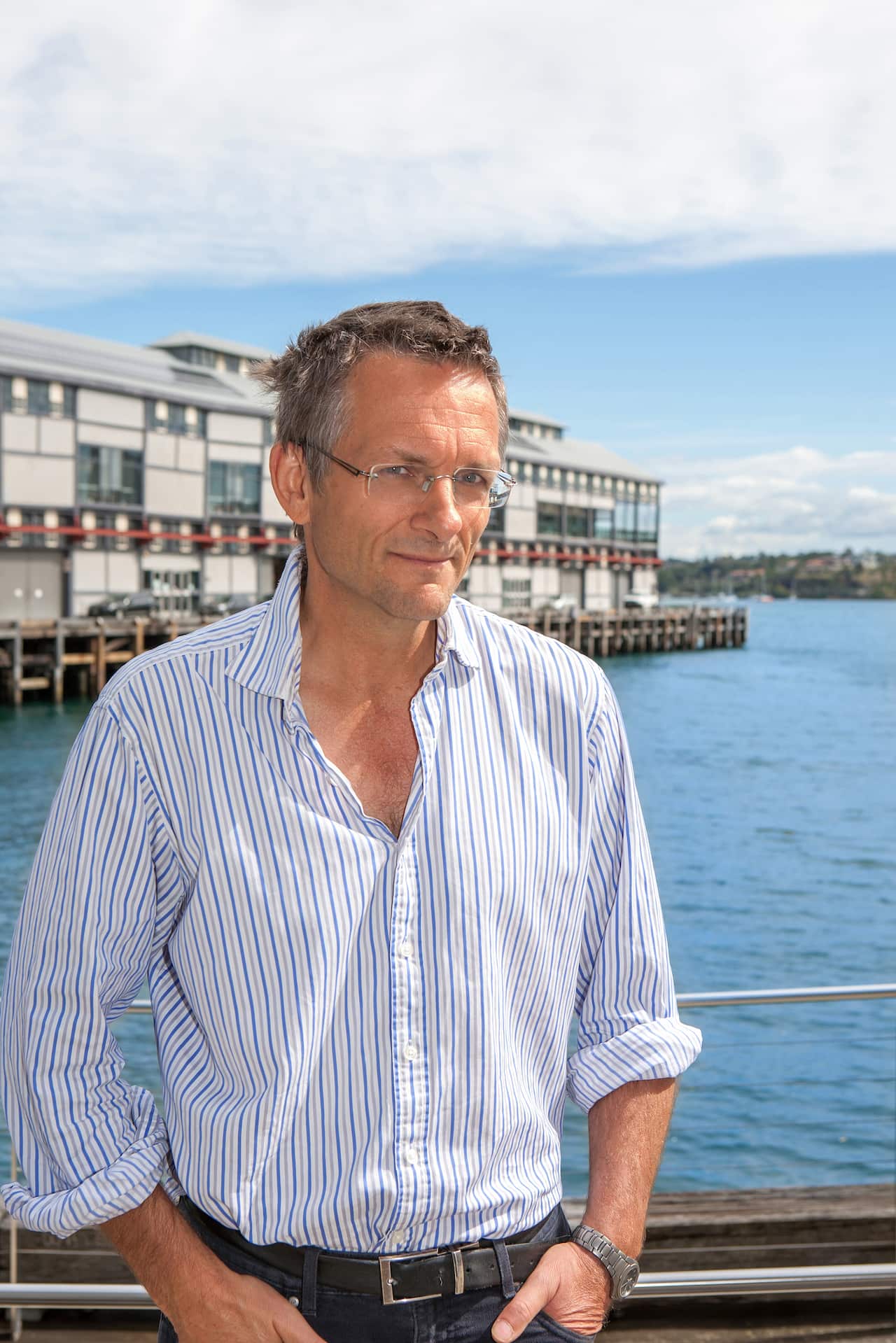 A man against the backdrop of water.