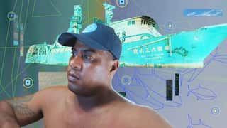 A man wearing a cap. A graphically altered boat is in the background.