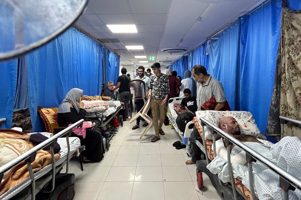 People in a hospital corridor