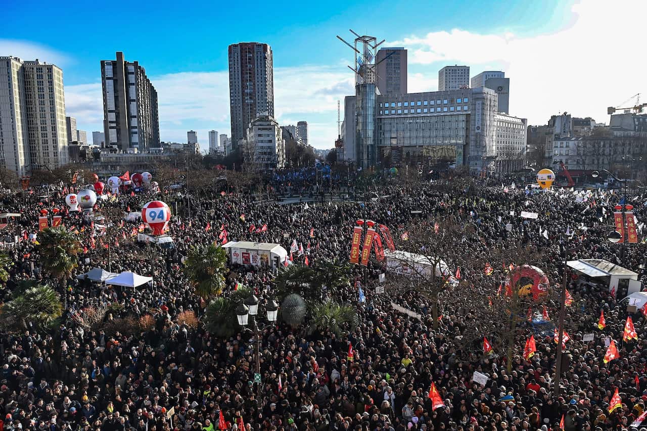 Protesters gather at Place d'Italie square in Paris to demonstrate against the pension reform on 31 January 2023.