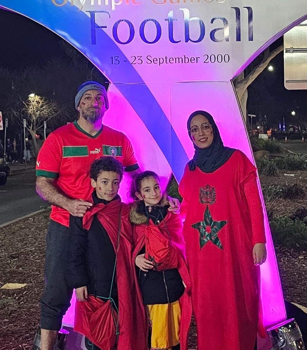 Samira Al Kraymy with Moroccon Flag.jpg