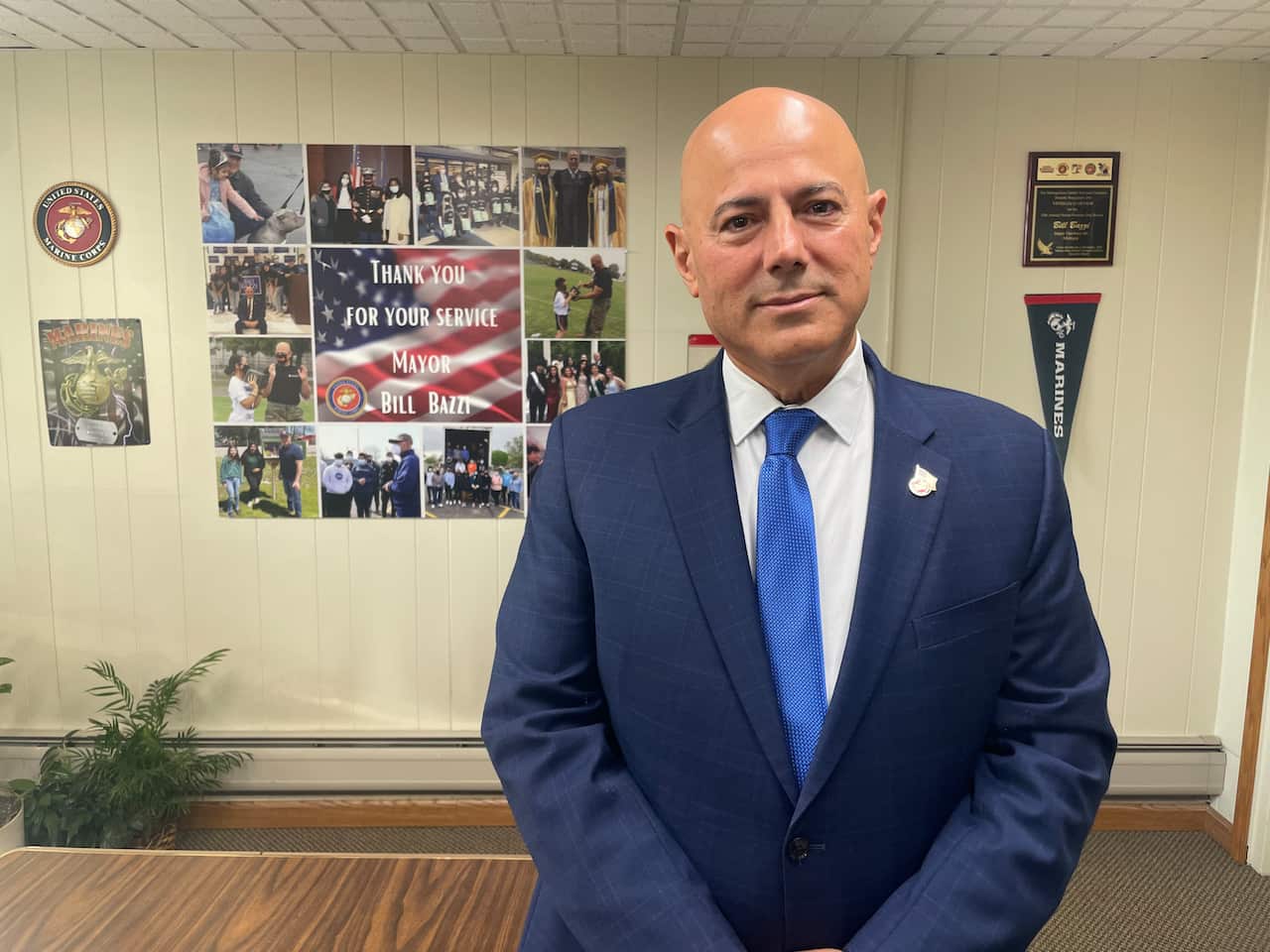 A man in a blue suit