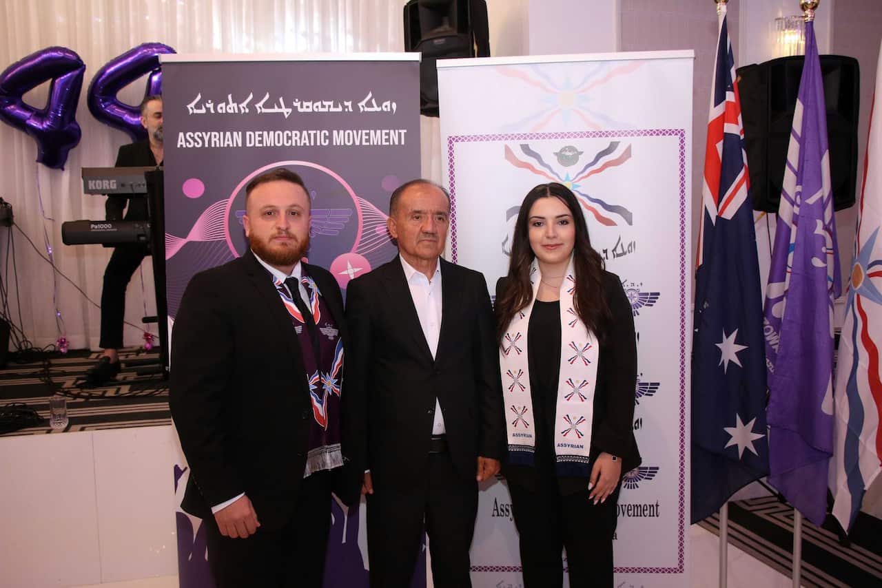 Guest of ADM from Homeland Hurmez Odisho with ceremony MCs Romrama Romel and Domer Albazi.jpg