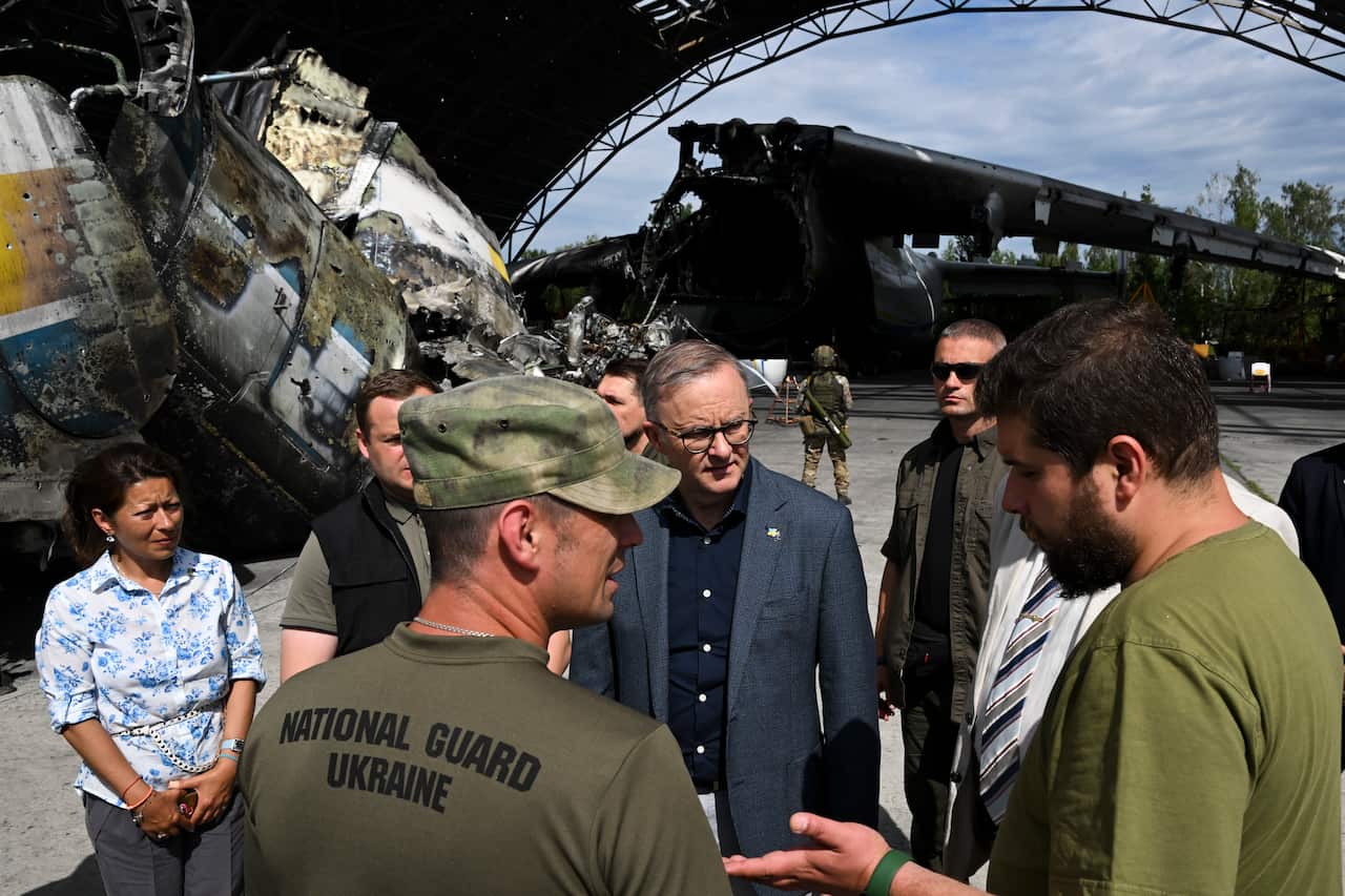 Australian Prime Minister Anthony Albanese speaks to members of the Ukrainian National Guard at Hostomel airport on the outskirts of Kyiv, Ukraine.