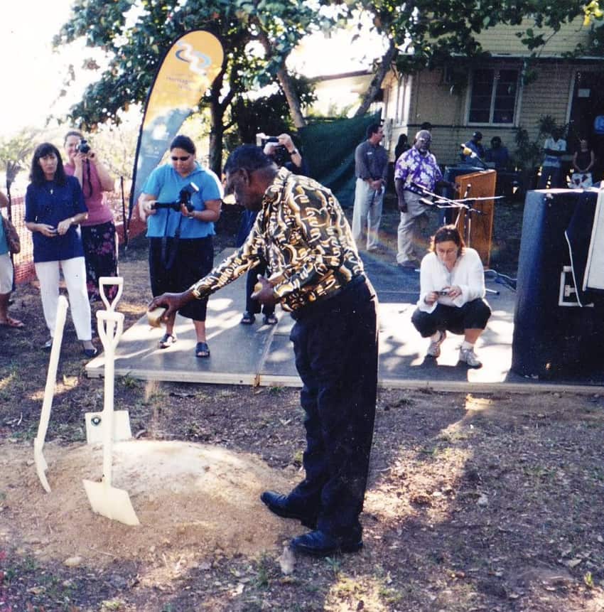 The late Ephraim Bani sprinkles sand in the soil on Waiben where the cultural centre would be built. 