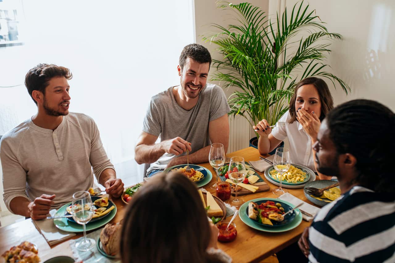 Young People Eating Together