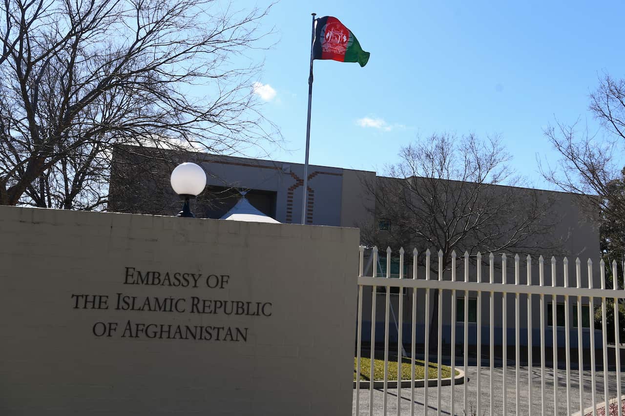 The Afghan embassy in Canberra, a pale building with a closed gate. 
