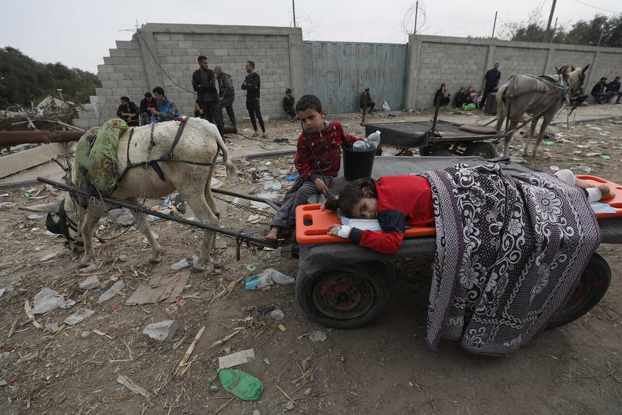 An injured Palestinian girl on a donkey cart