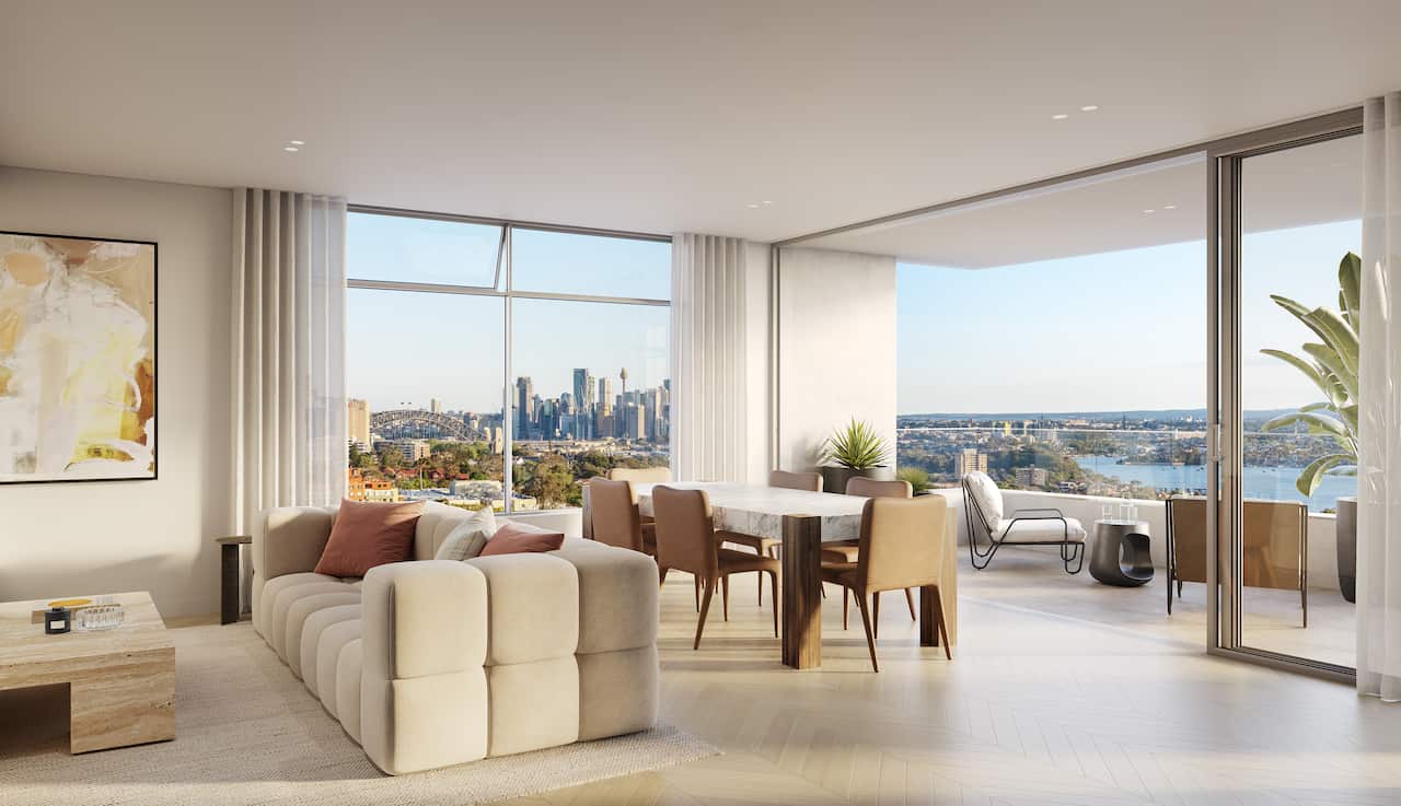 A living area with sofa and dining table featuring wall-to-ceiling windows.