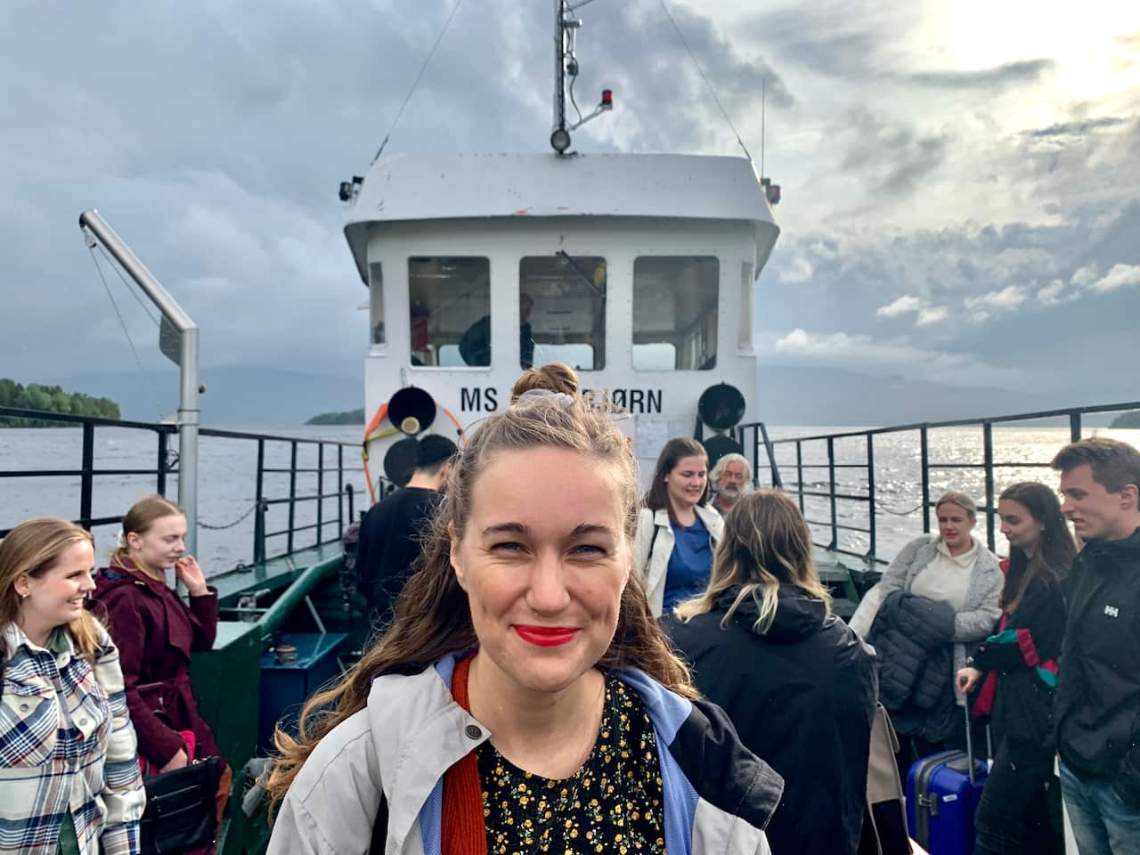 Utøya survivor Ina Libak standing on a boat.