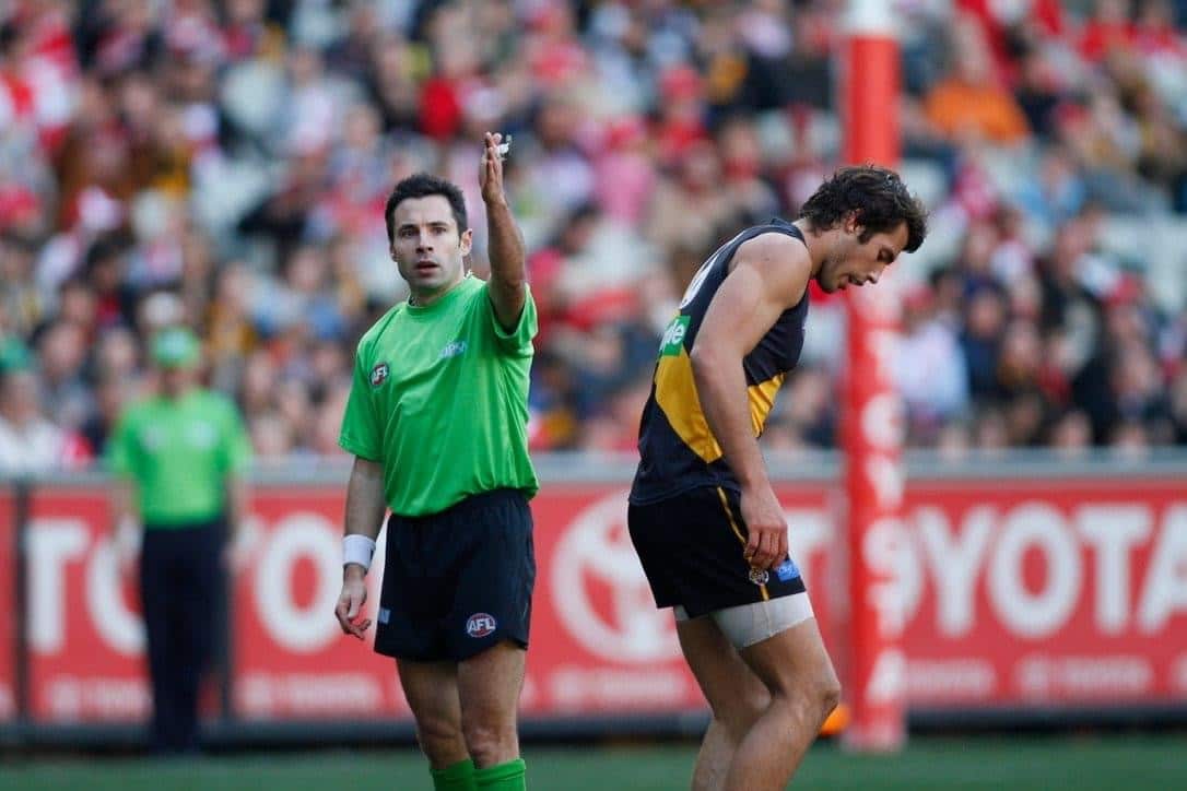 an umpire at an AFL game