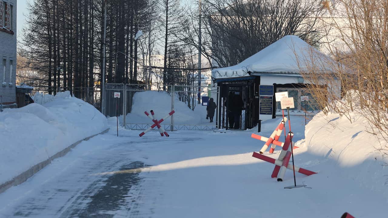 A snow-covered entrance to a prison.