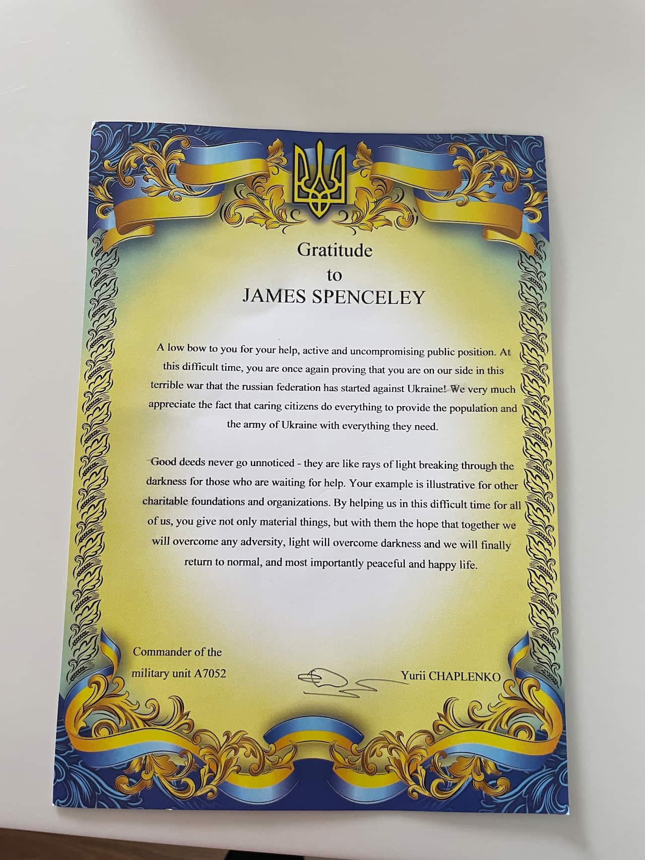 Certificate with writing on it