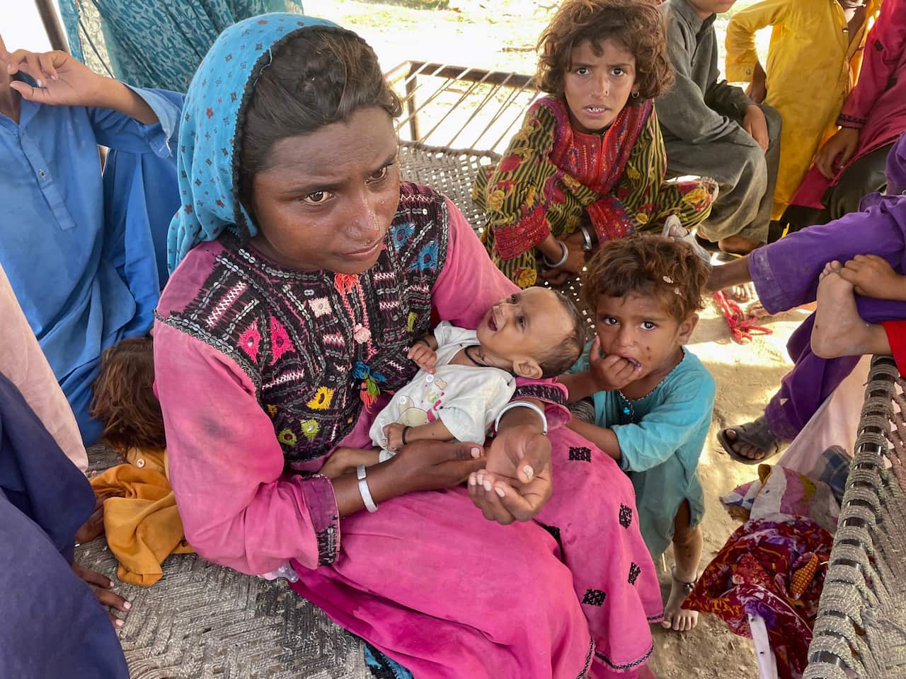 Mahagun Baloch tried to give her baby water.jpg