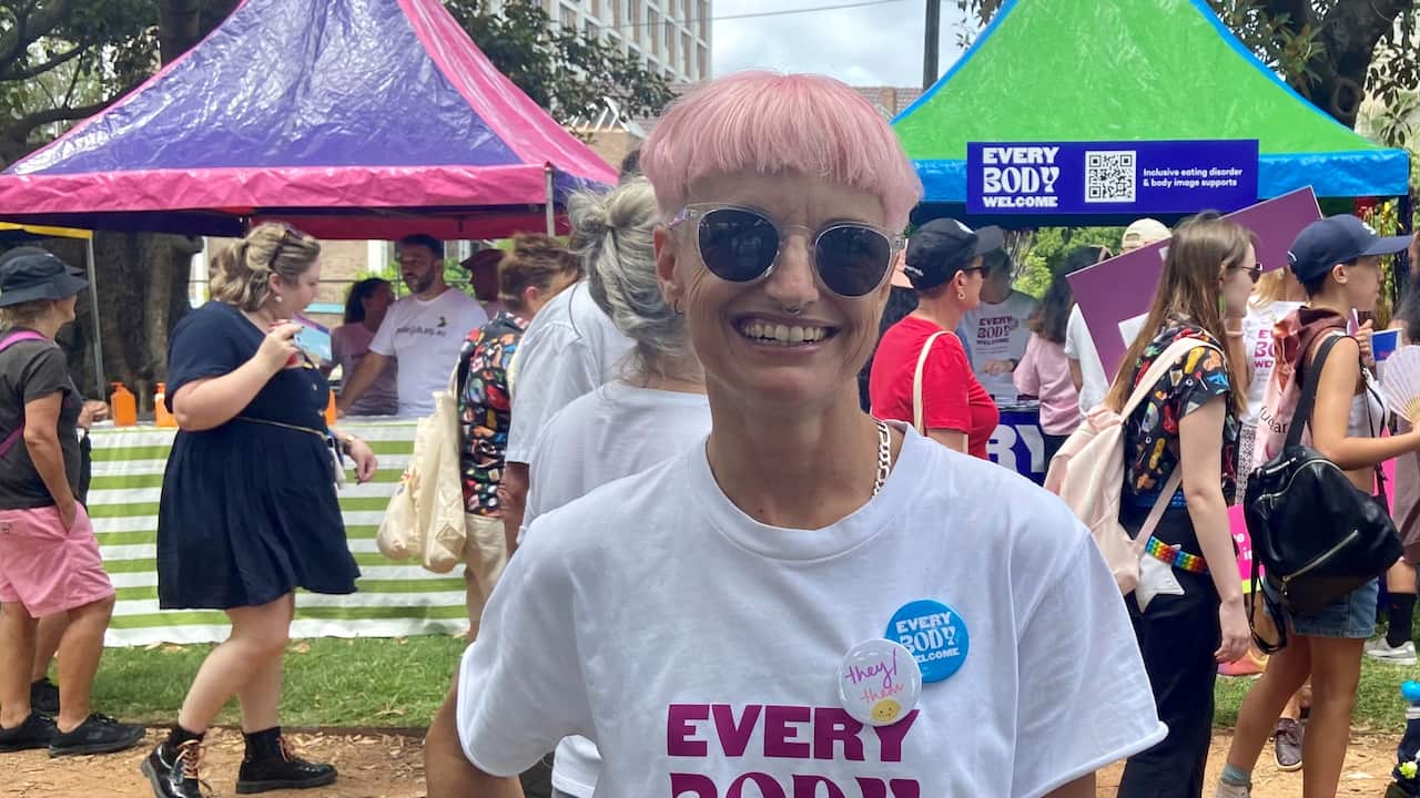 Anna Rose standing outside at Mardi Gras fair day in Sydney.