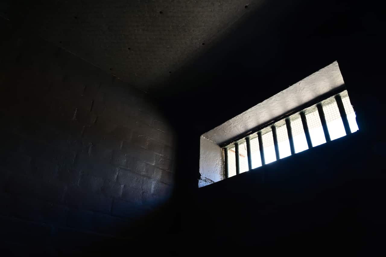 Dark room with window and bars background