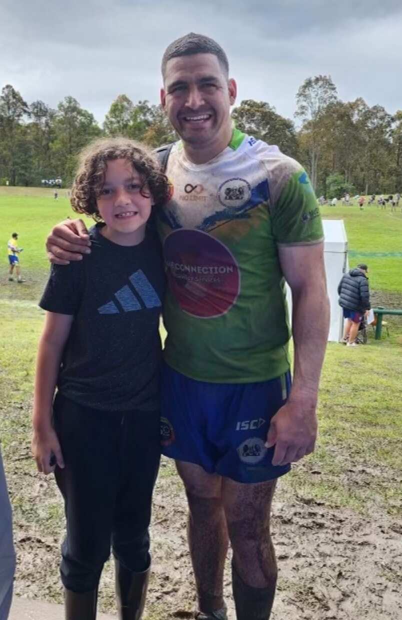 Cody Walker and a young fan