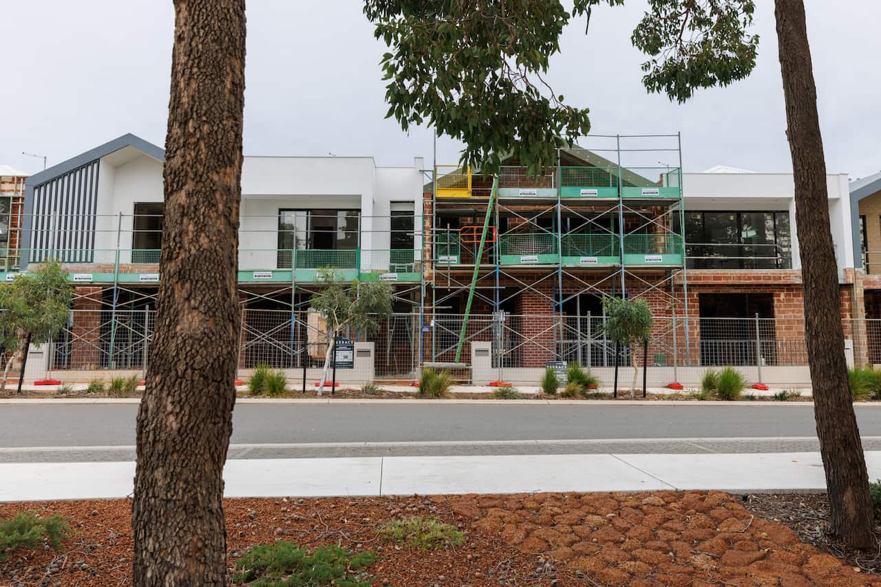 A row of houses under construction