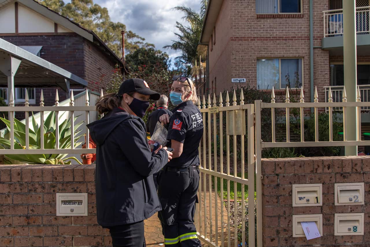 Firefighters conducting a home visit