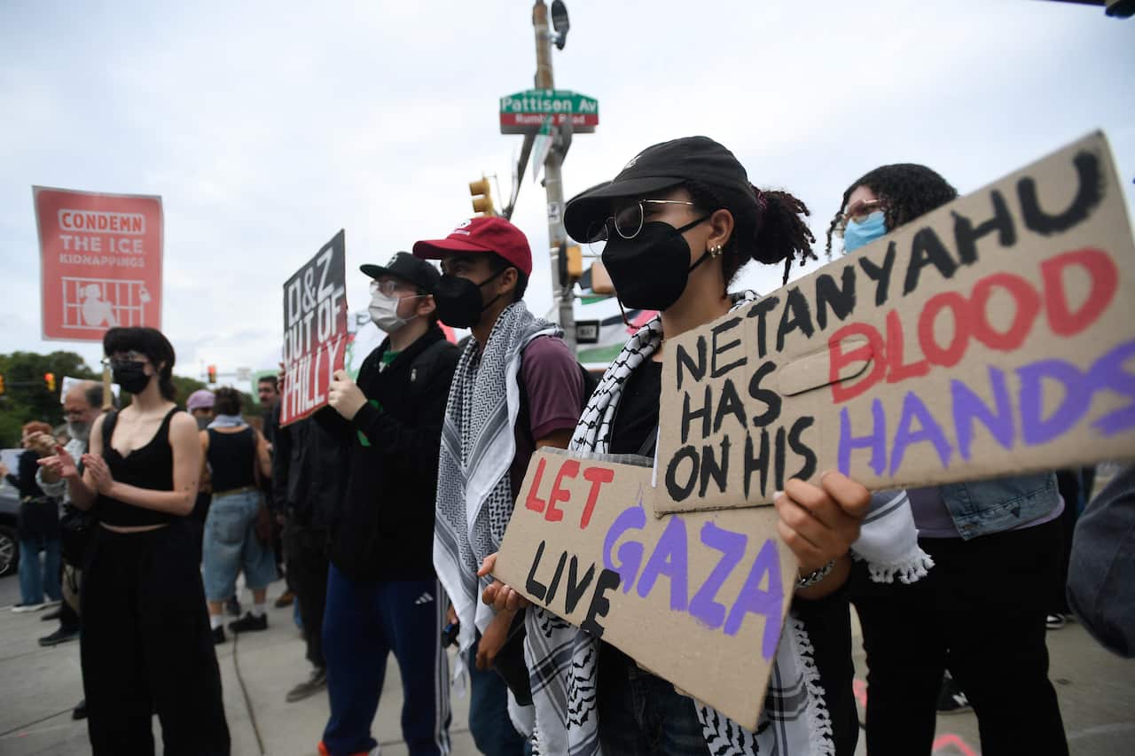 Protesters demonstrate near Lincoln Financial Field ahead/during Ed Sheeran's concert