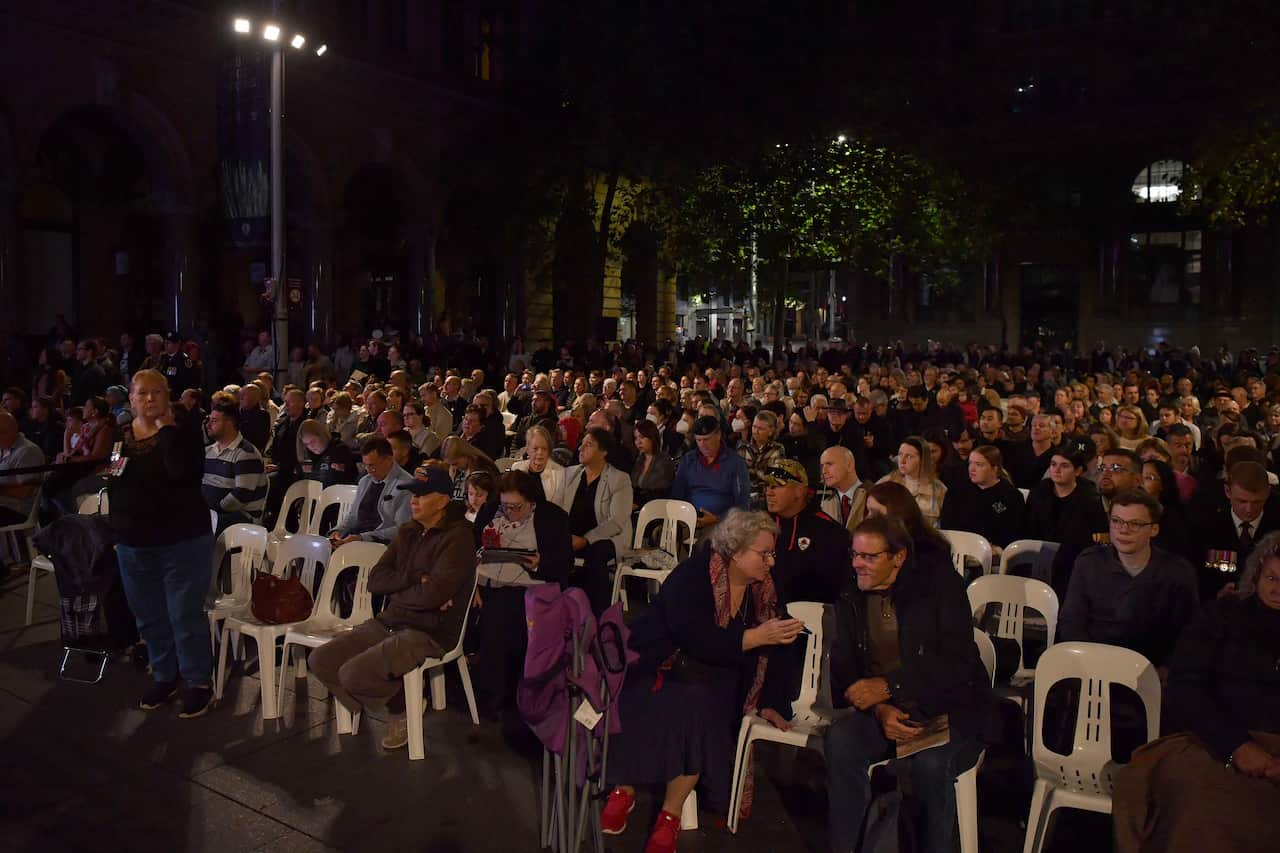A large group of people who are seated.