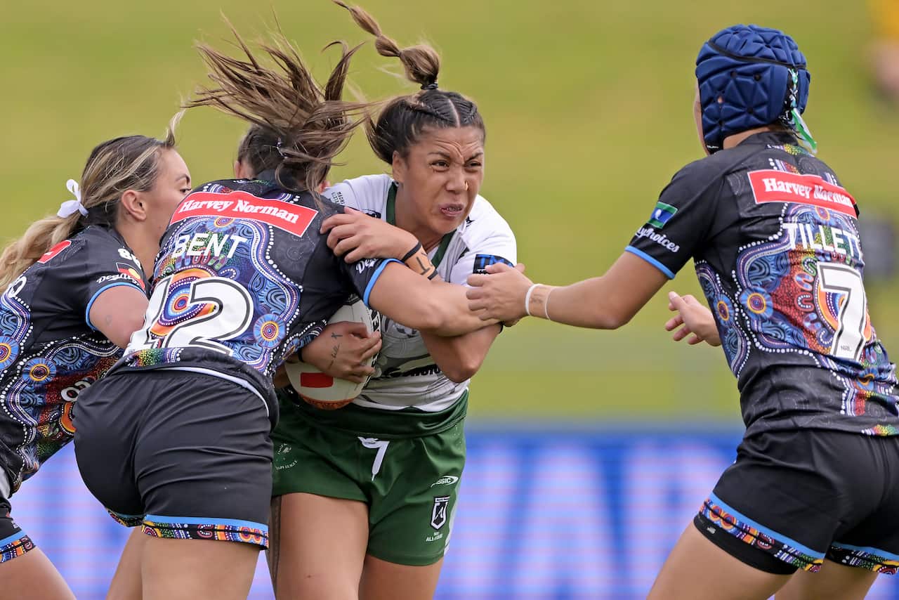 The Maori Ferns' Shannon Mato takes one up