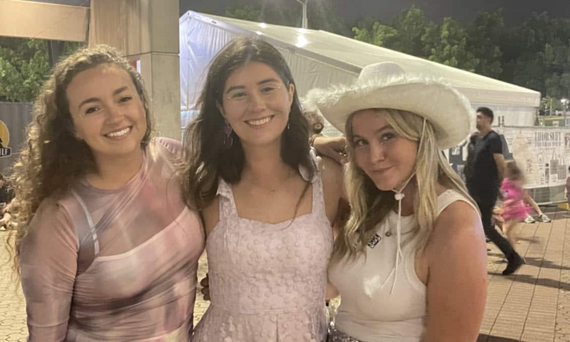 Three girls in sparkly dresses