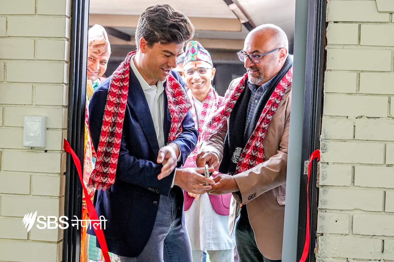 (L) Sam Rae, Federal MP for Hawke and (R) Peter Khalil, Federal MP for Wills inaugurate the Budhha stupa at ANMC with a ribbon-cutting ceremony.