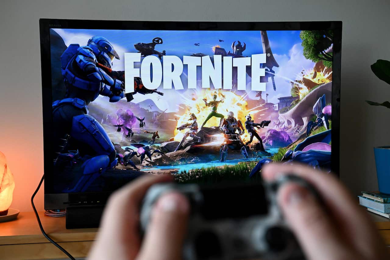 A person playing the videogame Fortnite.