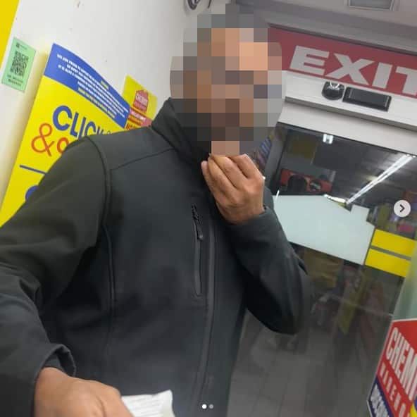 blurred chemist warehouse guy.png