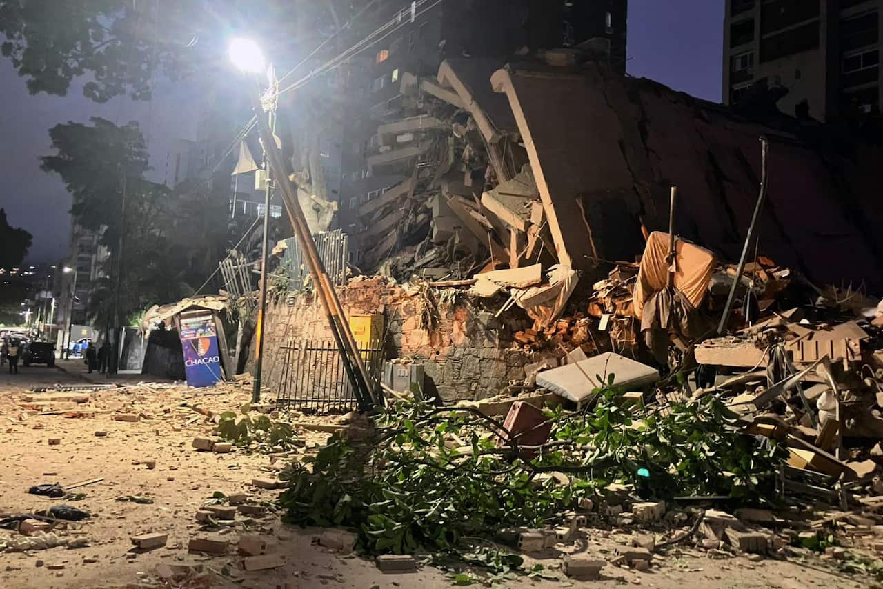 damaged buildings at night