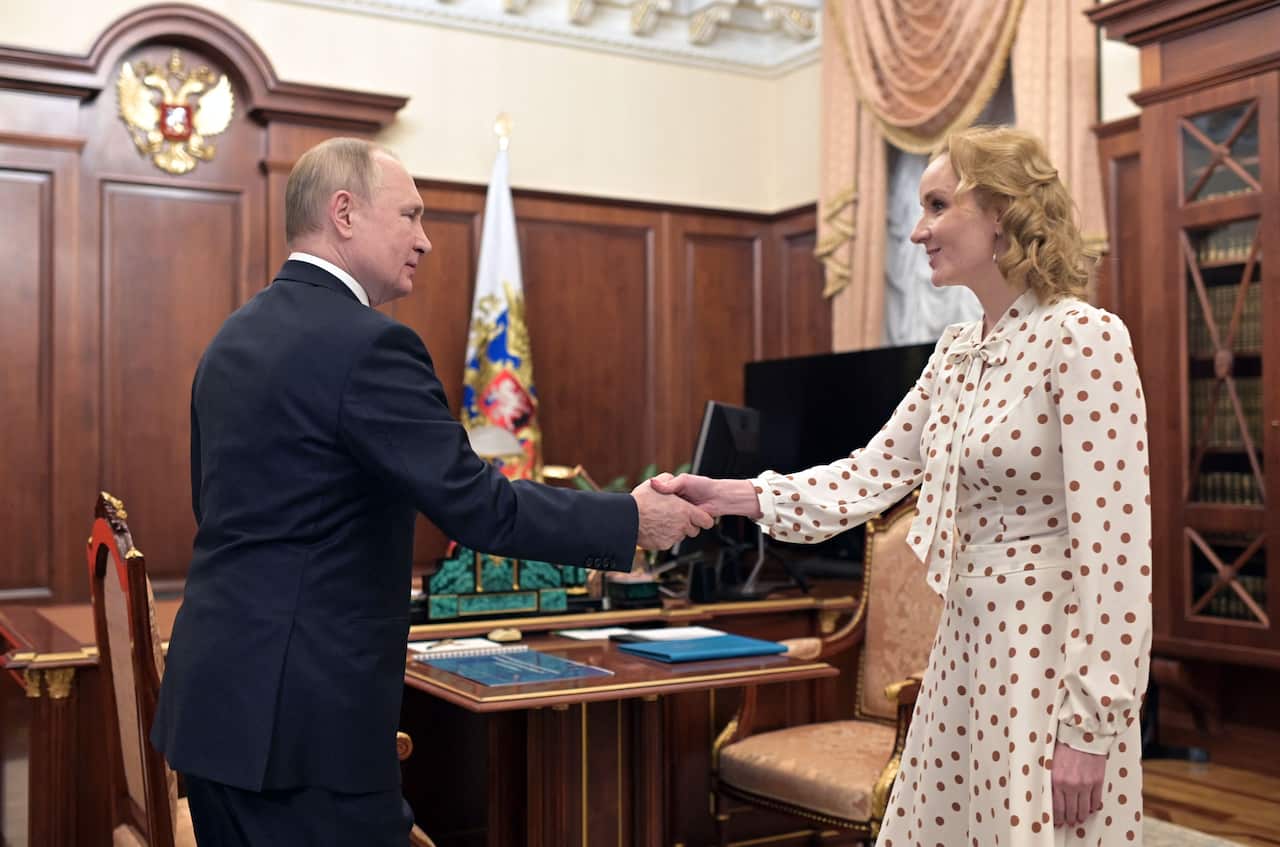 Russian President Vladimir Putin meets with Commissioner for Children's Rights Maria Lvova-Belova.